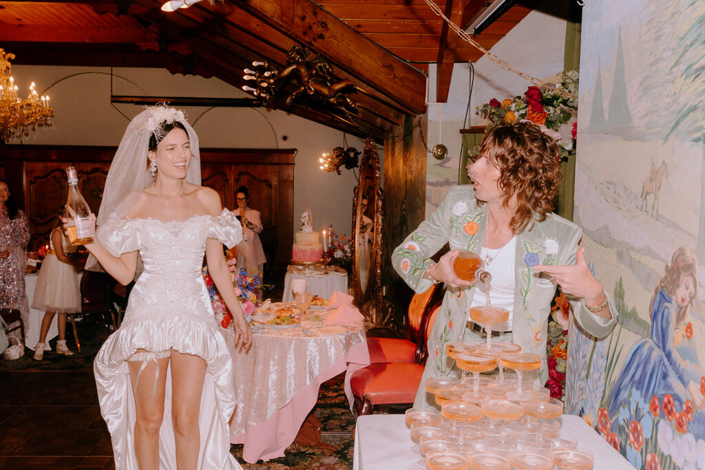 bride and groom trying their wedding cake