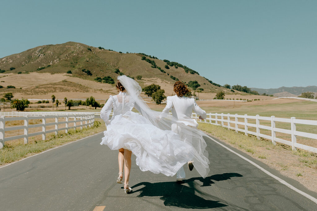 cute couple running during their bridal photos