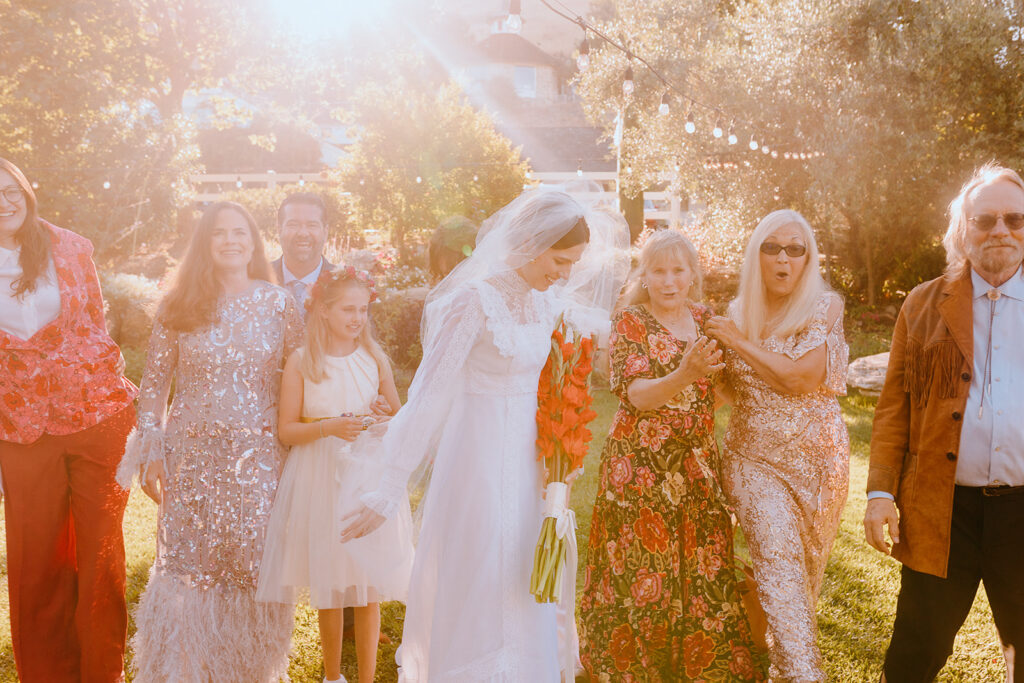 picture of the bride and her wedding guests 