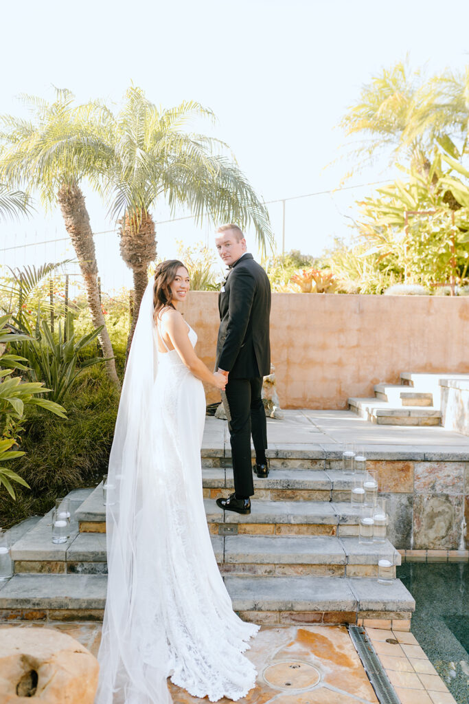 picture of the newlyweds holding hands