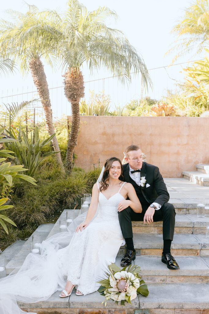 cute picture of the newly married couple at their beach wedding