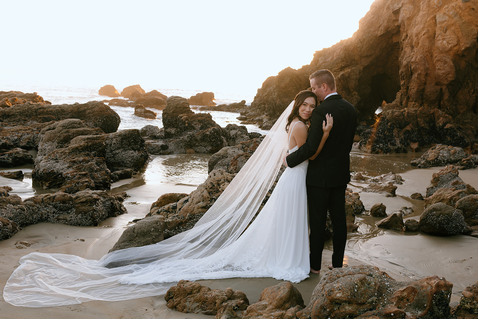 cute couple hugging during their photoshoot