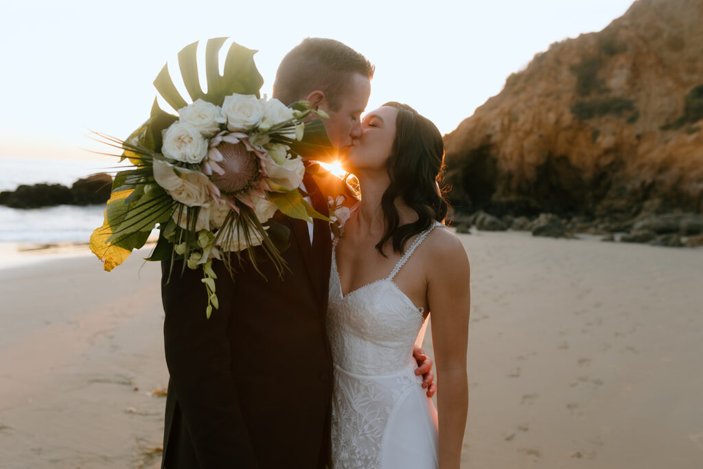 newly married couple kissing