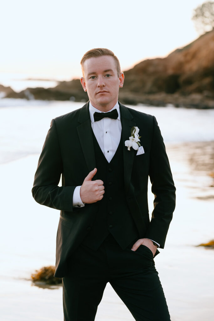 picture of the groom at the beach 