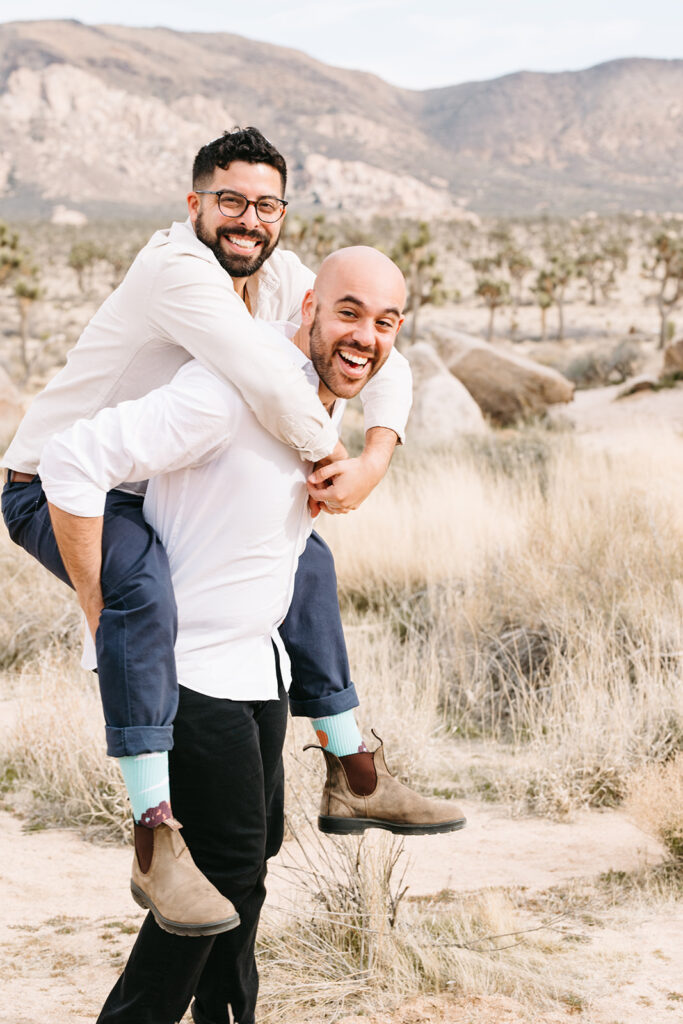 happy couple at their dream LGBTQ spring proposal in Joshua Tree