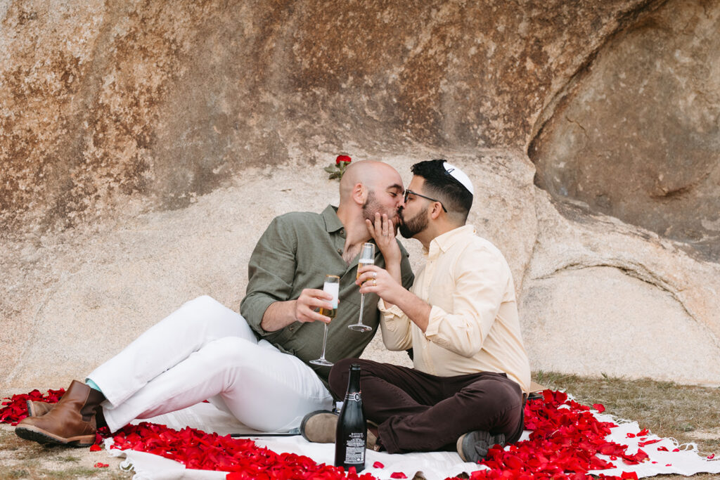 cute couple kissing during their dream proposal photoshoot 