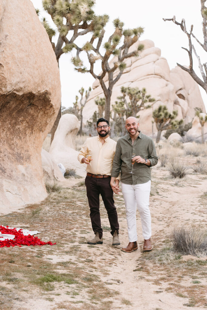 couple posing for the camera at their LGBTQ spring proposal