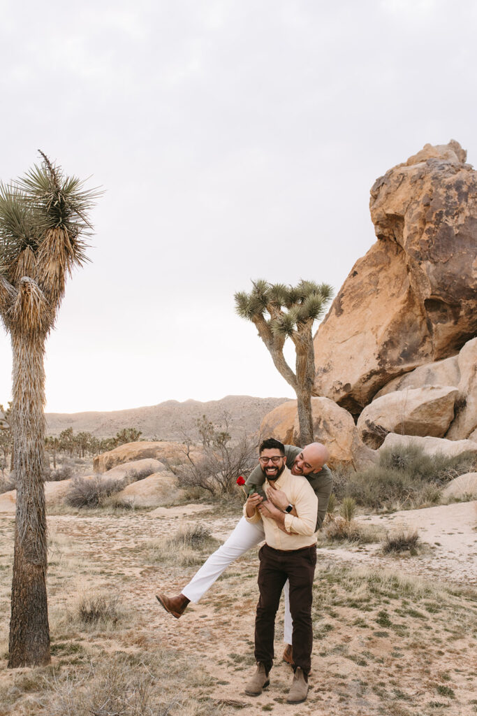 couple playing during their dream LGBTQ spring proposal