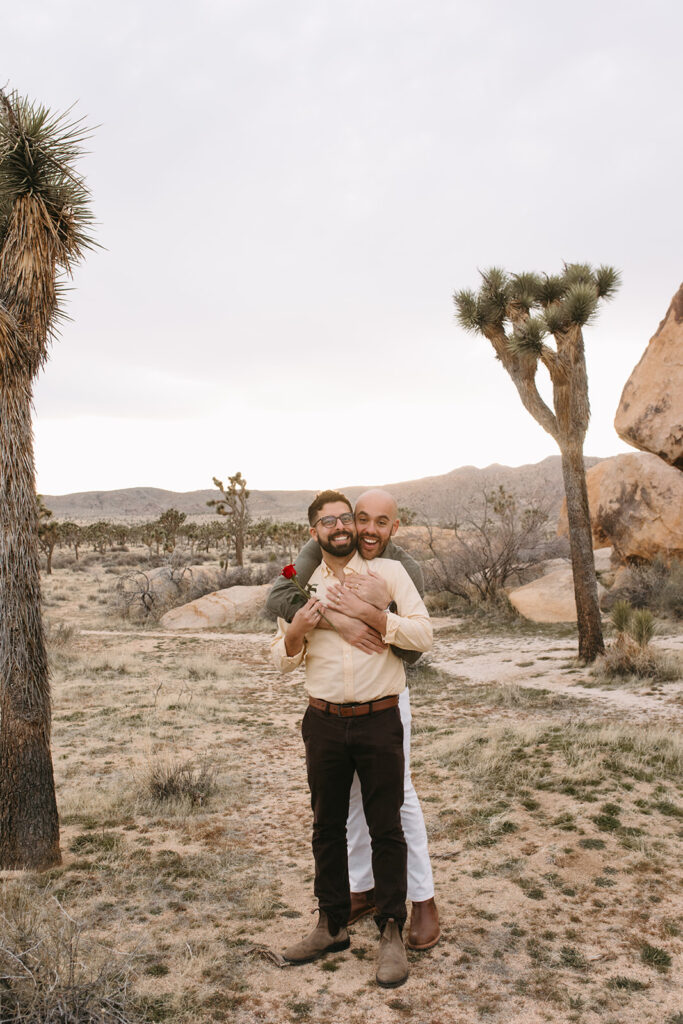 cute picture of the newly engaged couple hugging during their photoshoot