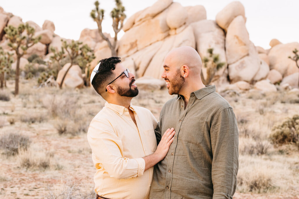 cute couple looking at each other during their dream photoshoot