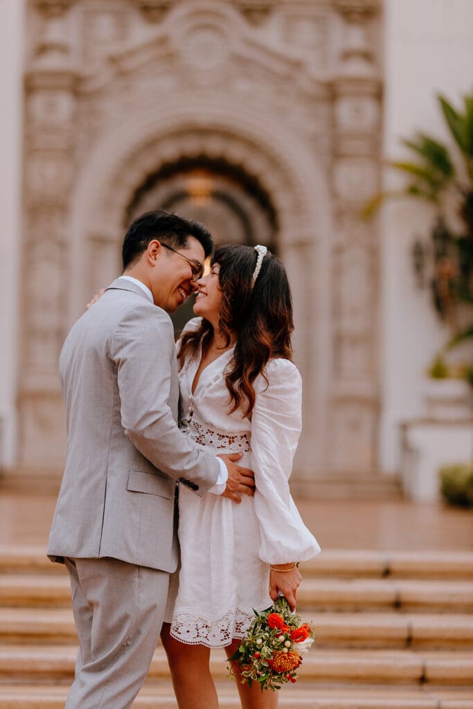 cute picture of the newlyweds kissing