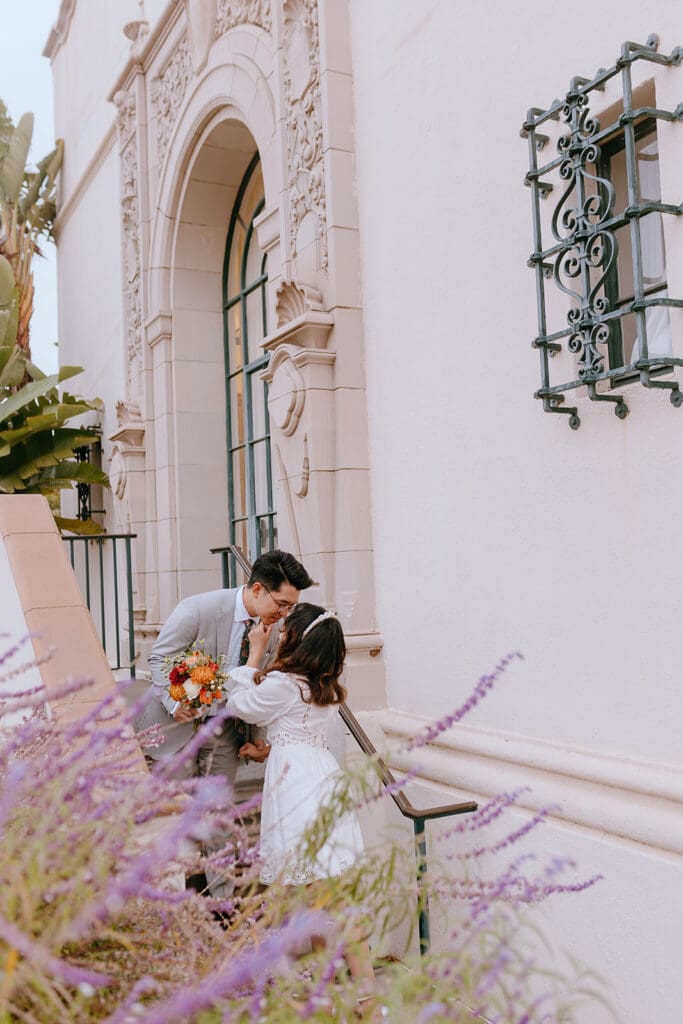 cute picture of the newlyweds kissing