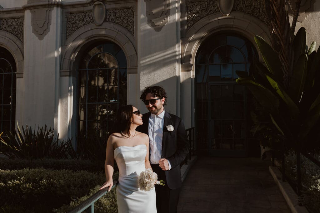 cute picture of the newlyweds smiling at each other