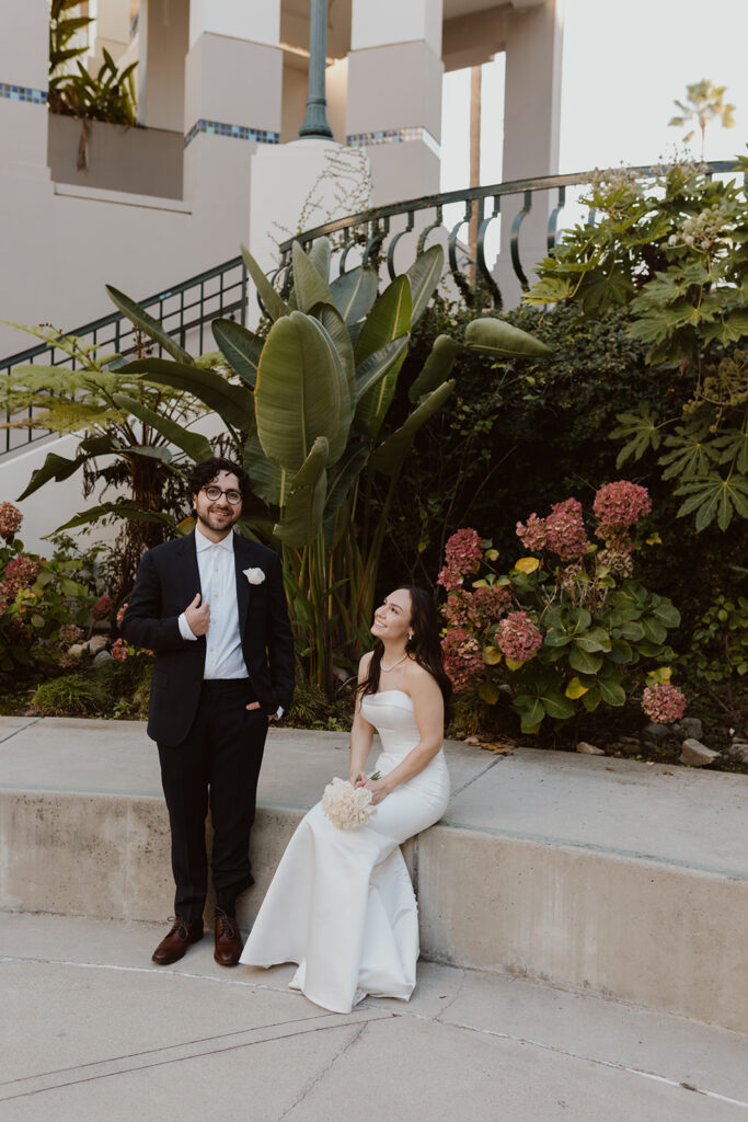portrait of the newlyweds laughing with each other
