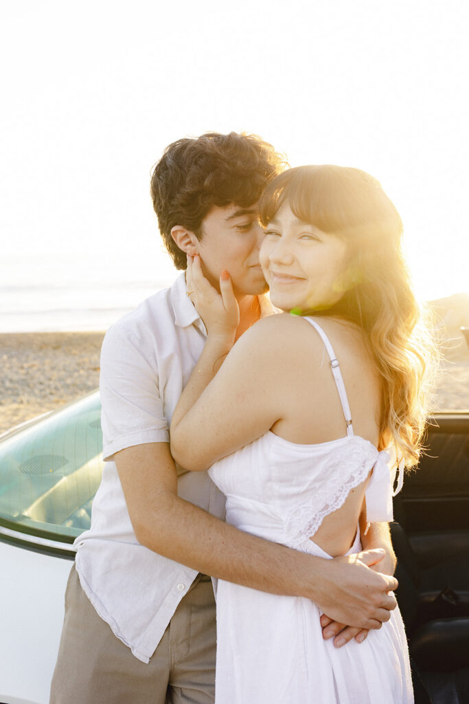 fiance kissing her fiance on the cheek