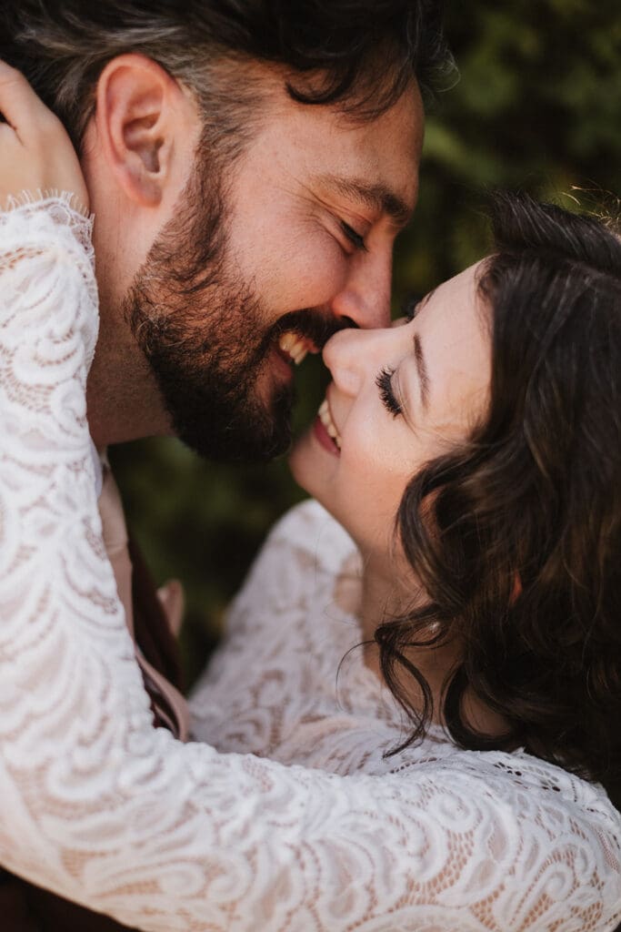 cute picture of the newlyweds kissing