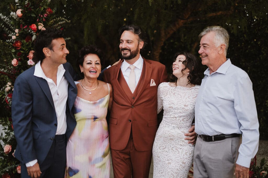 picture of the newlyweds and their family