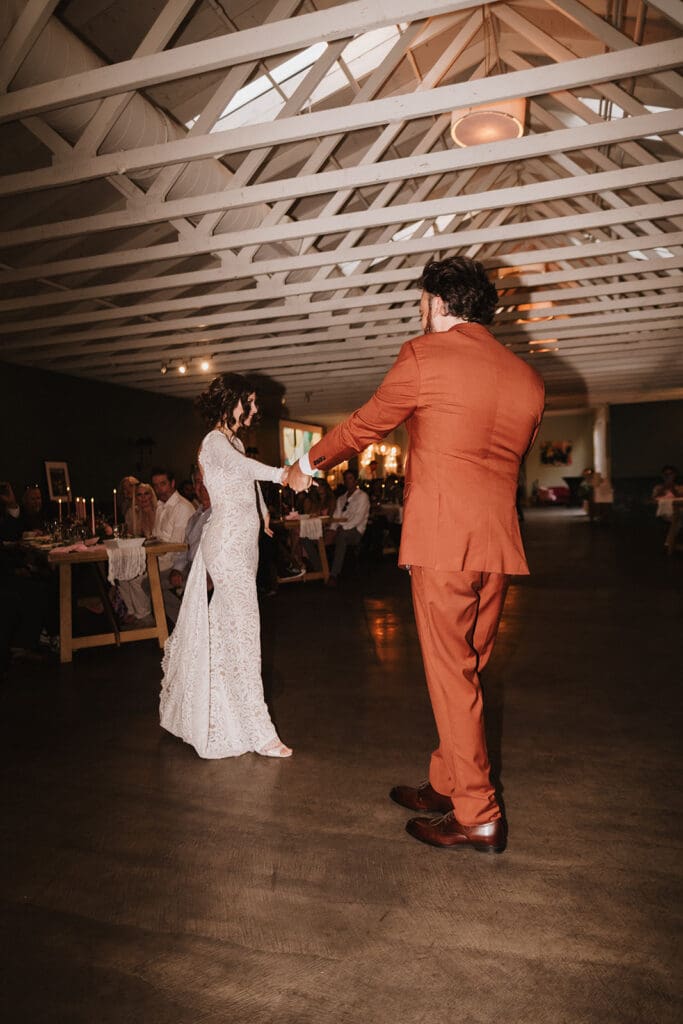 newlyweds dancing at the reception party