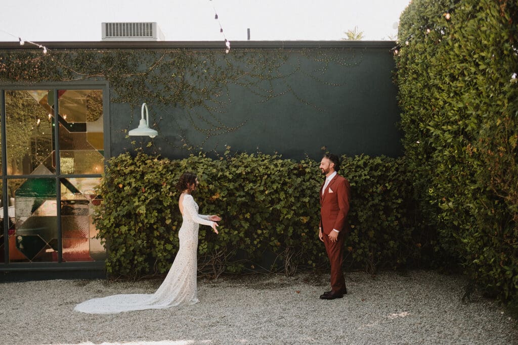 bride and groom at their first look